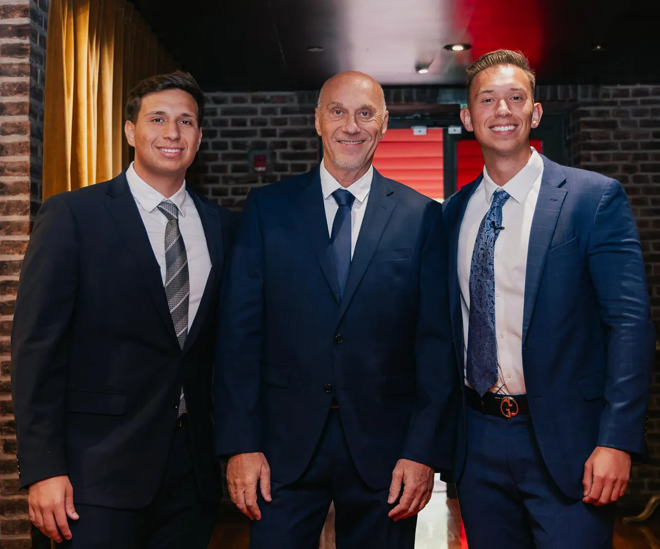 Kevin Rutois with his father, Daniel Rutois, and his brother
